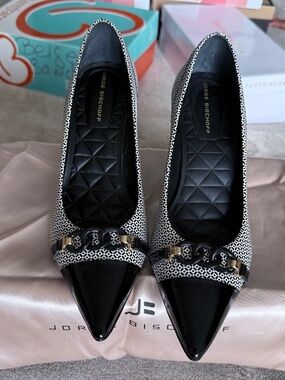 Beautiful black and white pumps by renowned Brazilian designer Jorge Bischoff